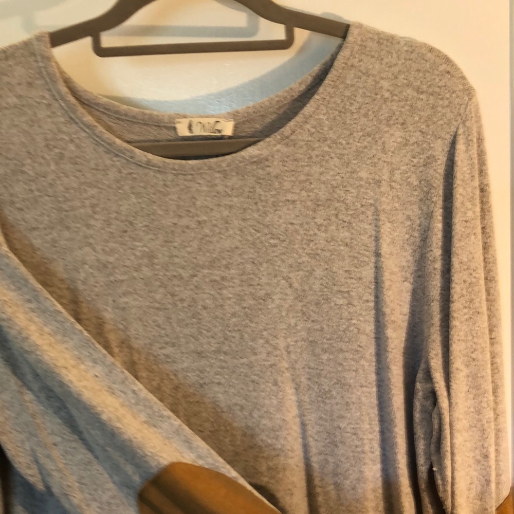 Grey tunic top with fun back button detail